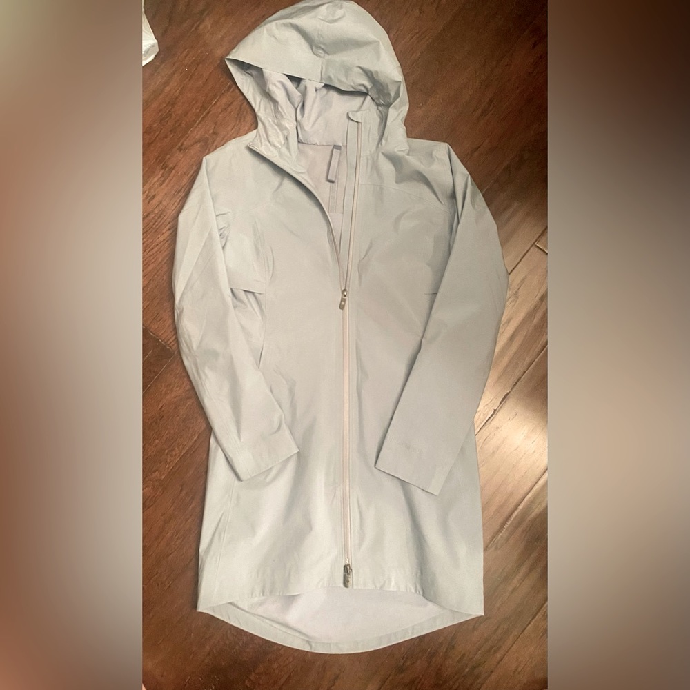 Light bluish/gray raincoat in EUC. Size 4….